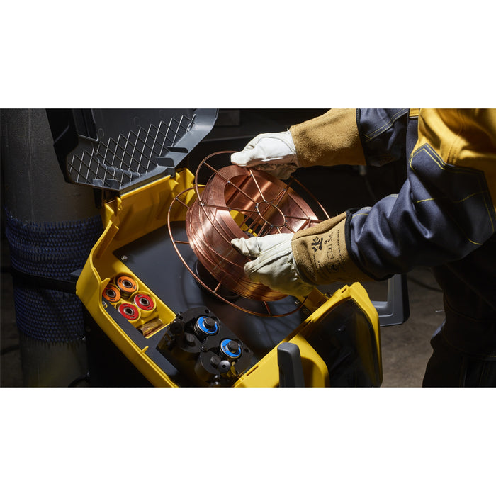 loading spool of mig wire into top area of cea dogma mig welder