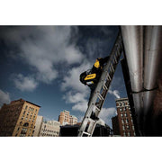 man climbing up ladder with esab rogue welder over shoulder