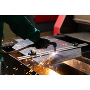 man using intellicut plasma cutting guide to cut a sheet half way through