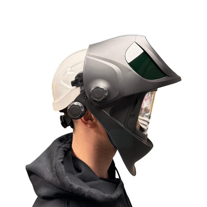 man wearing tecmen tm1000 flip front welding helmet connected to hard hat