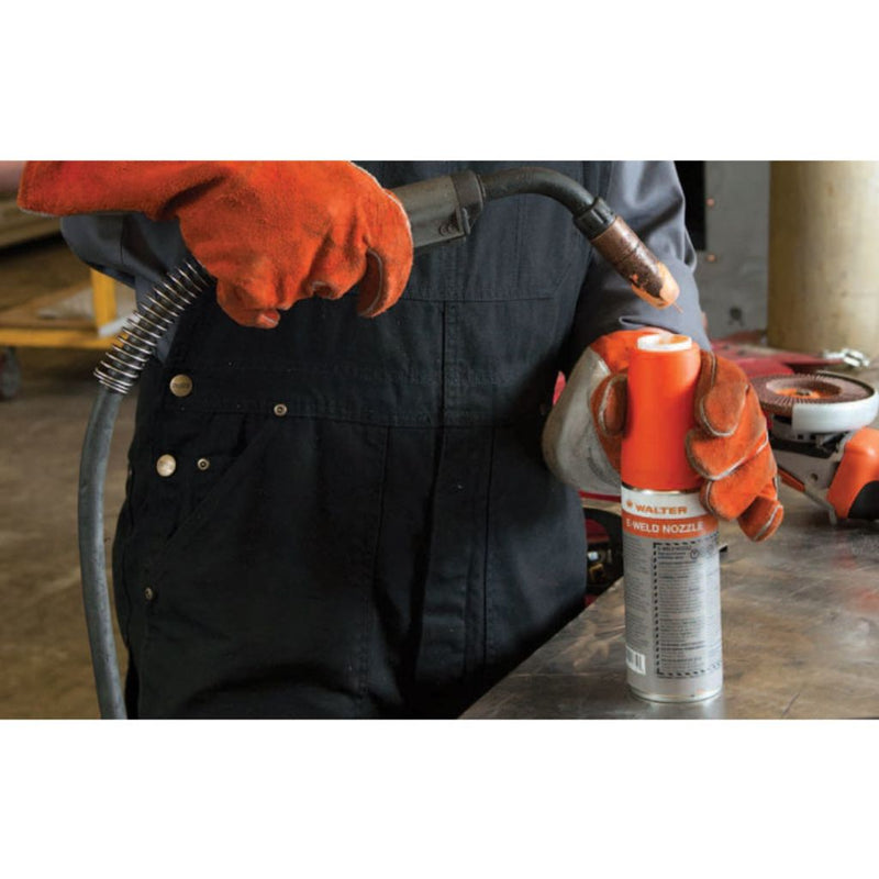 welder pushing his nozzle into walter e-weld anti spatter