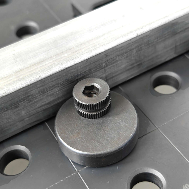 View of Ø 45mm Eccentric Stop in use with a 16mm welding table