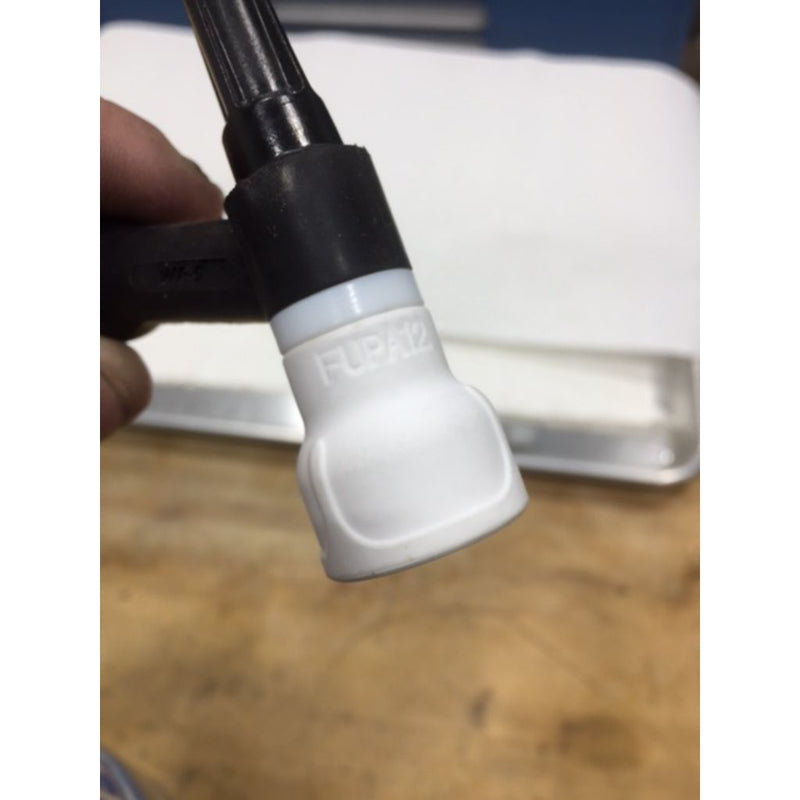 furick fupa 12 tig cup mounted to a tig torch pointing down
