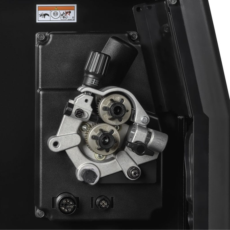 close up of drive rolls on miller multimatic 235 welder