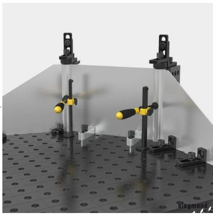 Siegmund flex stops being used to hold sheet metal in place on siegmund welding table
