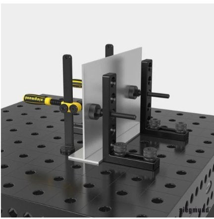 Siegmund spacers being used to hold a stainless steel component on a welding table
