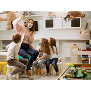 a teacher explaining something to students while wearing a clear n95 respirator mask