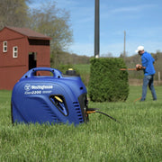 westinghouse igen2200 inverter generator in the yard being used with powertool